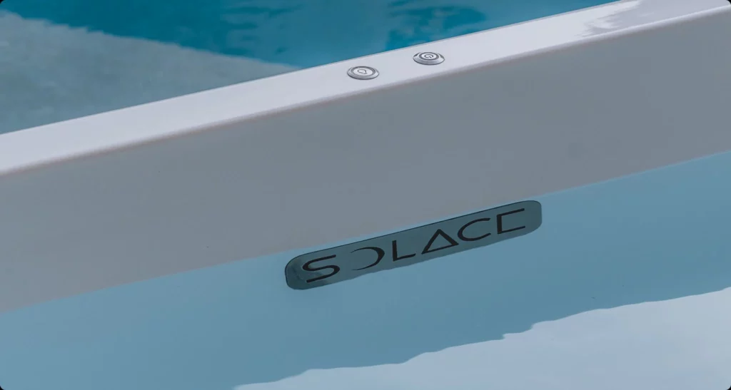 Close-up of the water inside a Solace ice bath with the Solace logo visible below the waterline